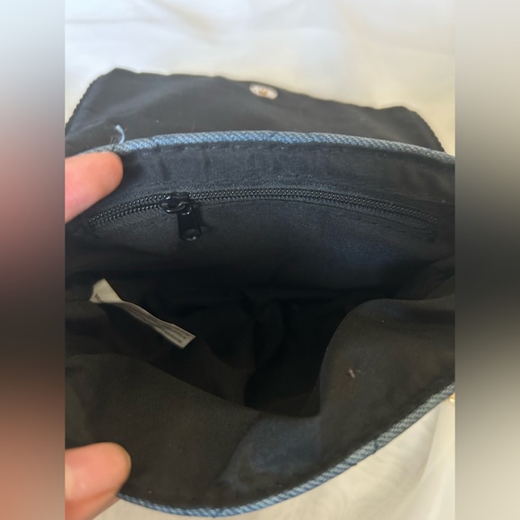 Swayed blue purse with gold colored chain. - Picture 2 of 4